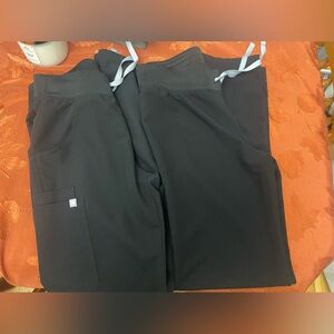 XSMALL TALL black figs pants. One is kade and the other I’m not sure